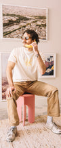 Man wearing a cream t shirt with a banana and sunglasses in san luis obispo