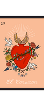 Framed artwork of a red heart with flowers and birds on a peach background, titled 'El Corazon'. Buen Dia art prints San Luis Obispo