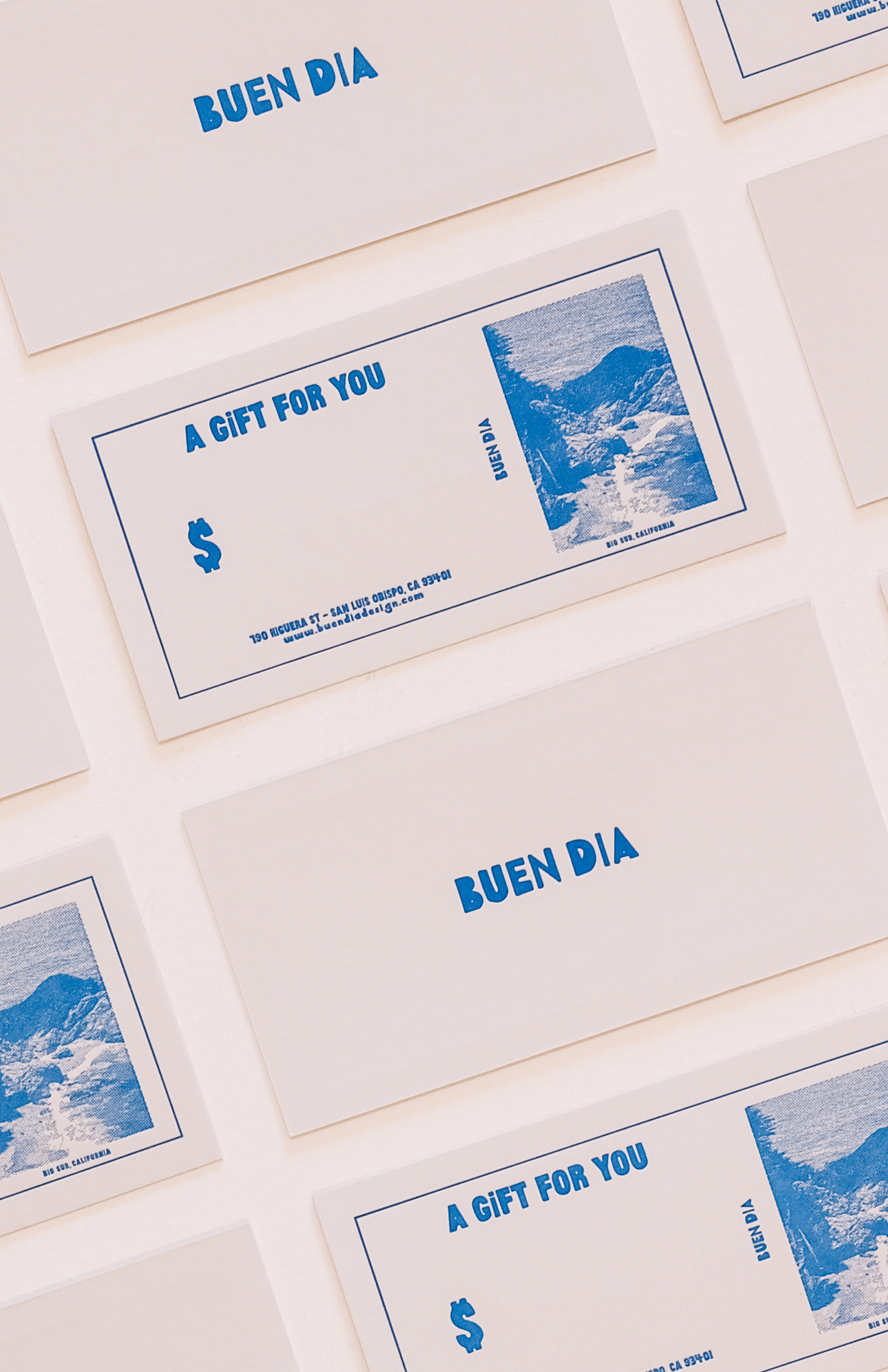 Gift cards with 'Buen Dia' and 'A Gift For You' text on a white background