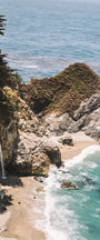 A photograph capturing Mcway Falls in Big Sur, California, with a backdrop of the Pacific Ocean and dramatic cliffs.